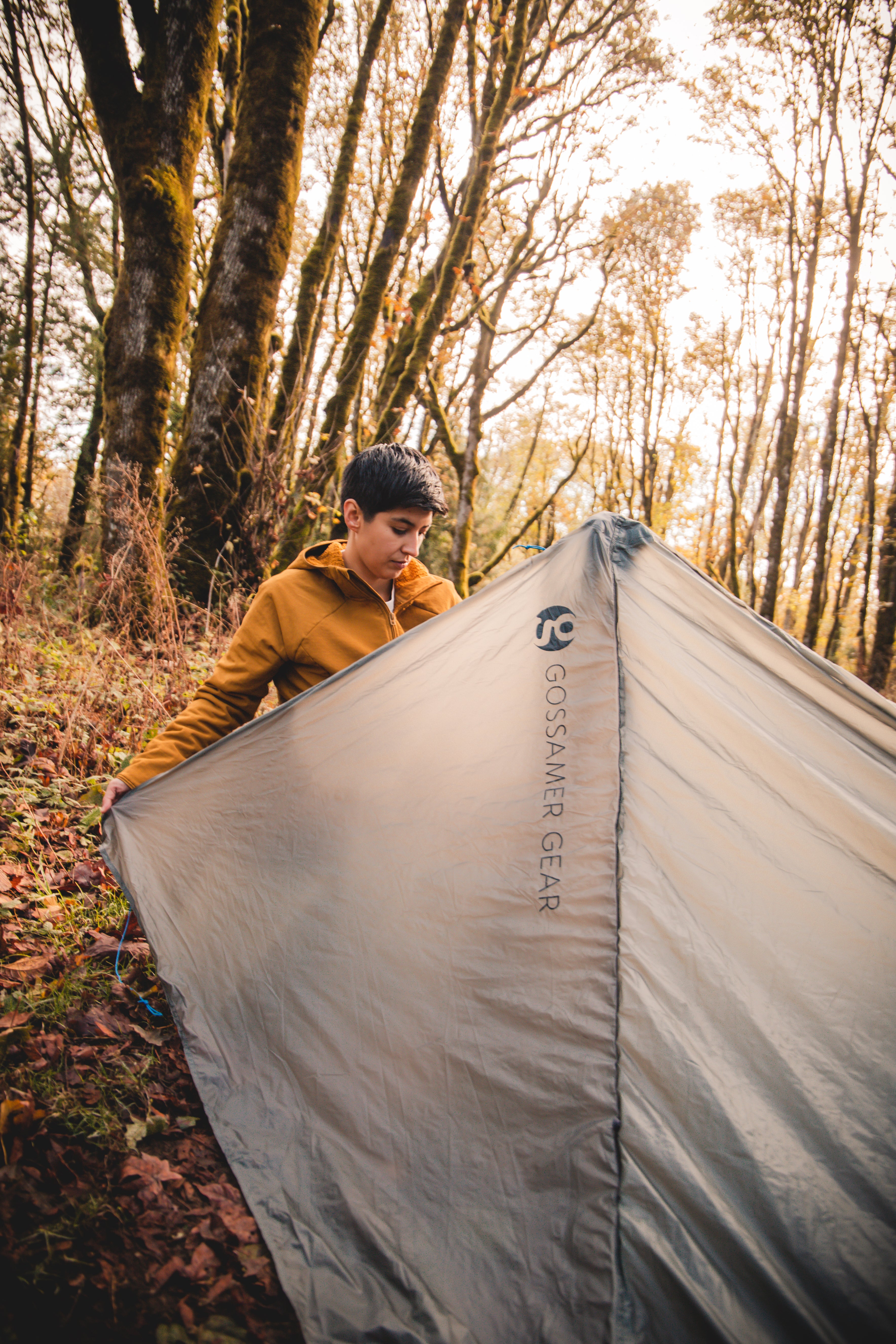 Person setting up The One Ultralight Shelter